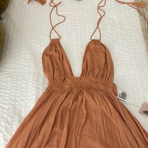 Long orange/salmon color dress. Perfect for weddings or a casual summer dress